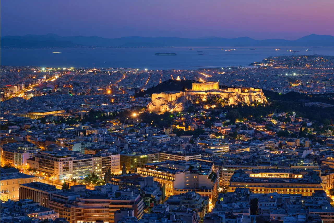 Athens skyline at night with the illuminated Acropolis
